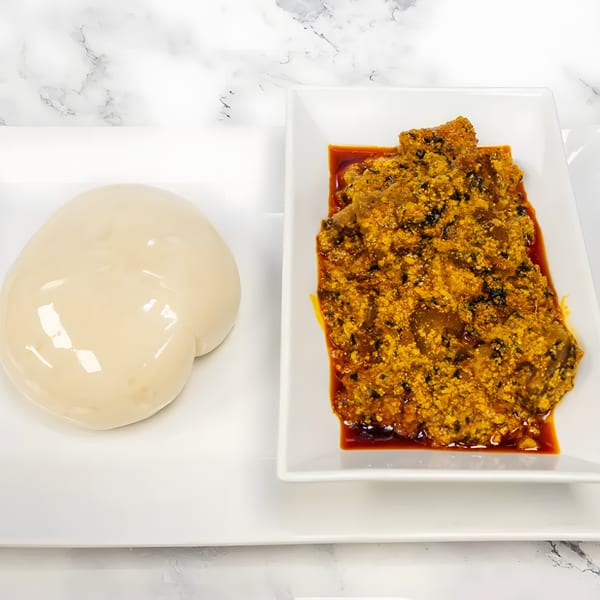 Aroma Restaurant & Lounge's African dish with a mound of fufu and a rich, yellow stew.