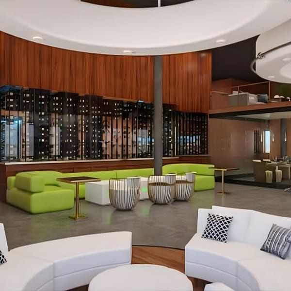 Modern lounge area with white and lime green sofas, wooden walls, and decorative screens.