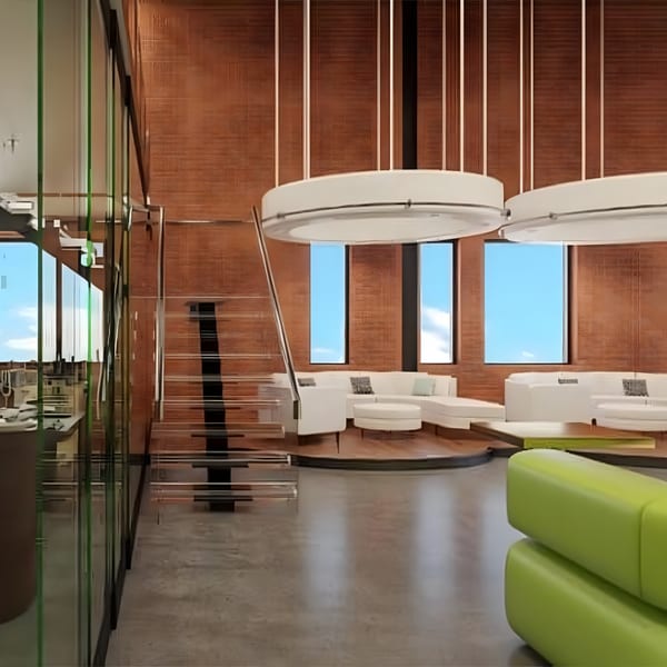 Modern lounge area with white sofas, a glass staircase, and large windows, at Aroma Restaurant.